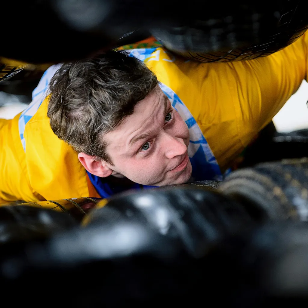 man crawling in a confined space