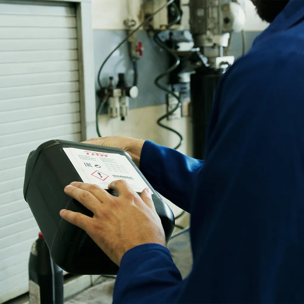 Man checking a piece of electric test gear